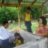 Missionary Zaw baptizing a new believer